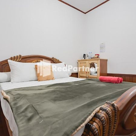 Langkar Guest House Syariah Mitra Reddoorz Samarinda Buitenkant foto