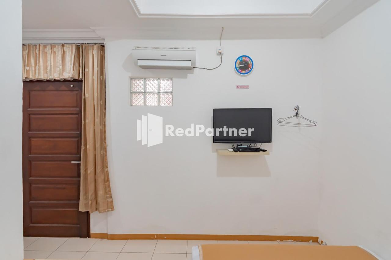 Langkar Guest House Syariah Mitra Reddoorz Samarinda Buitenkant foto