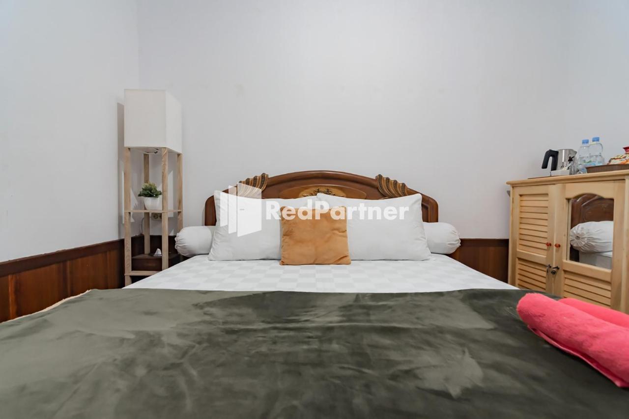 Langkar Guest House Syariah Mitra Reddoorz Samarinda Buitenkant foto