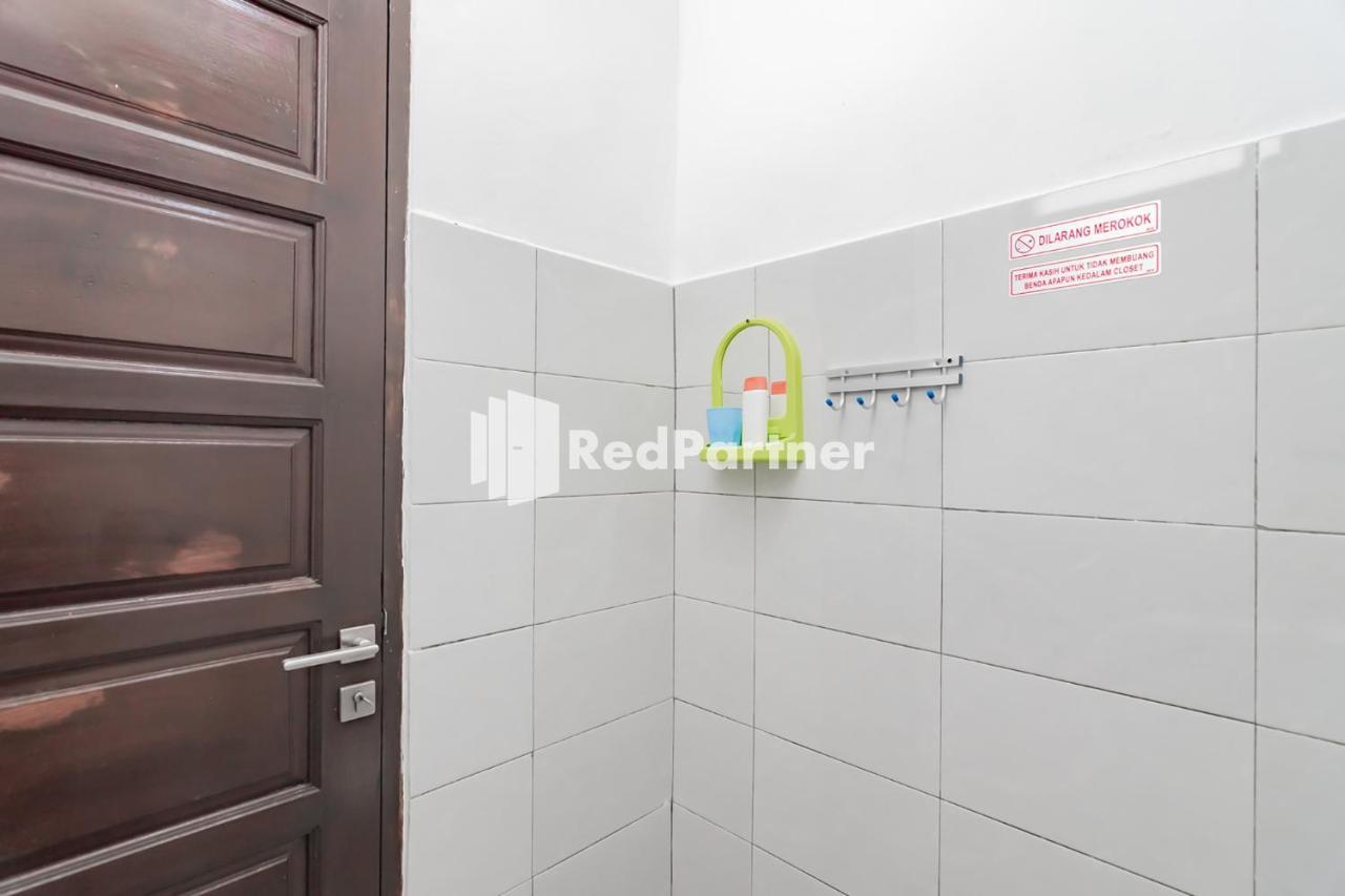 Langkar Guest House Syariah Mitra Reddoorz Samarinda Buitenkant foto
