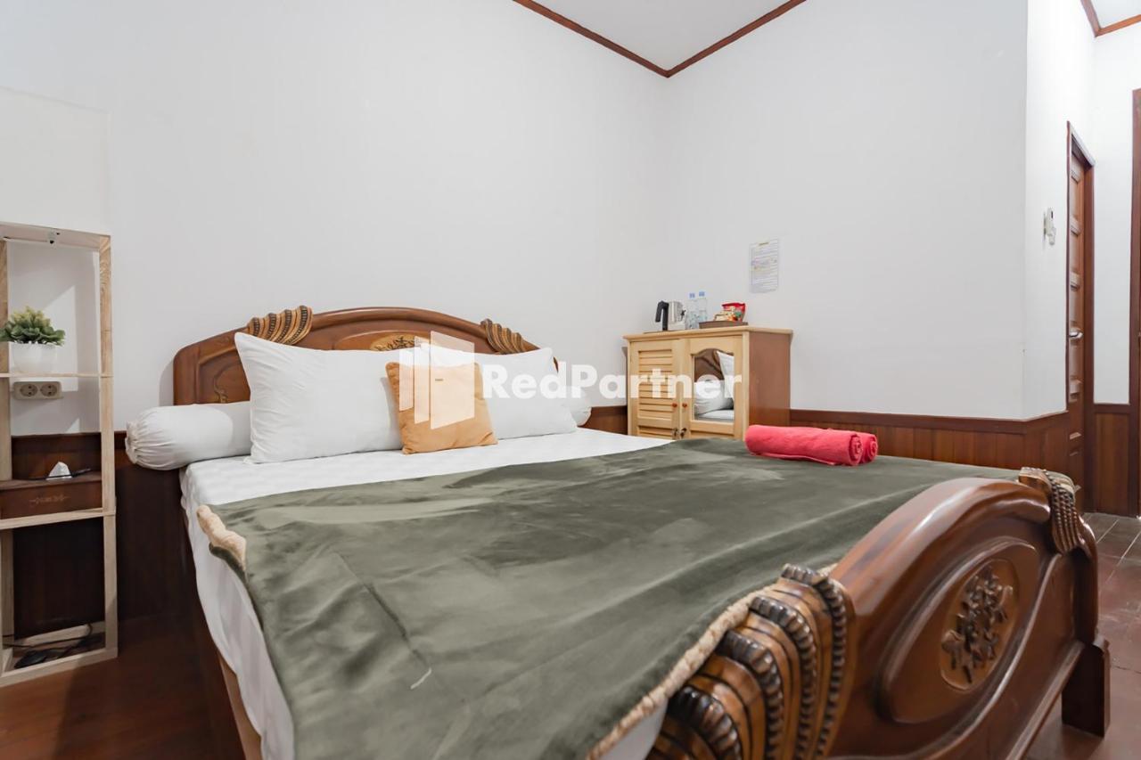 Langkar Guest House Syariah Mitra Reddoorz Samarinda Buitenkant foto