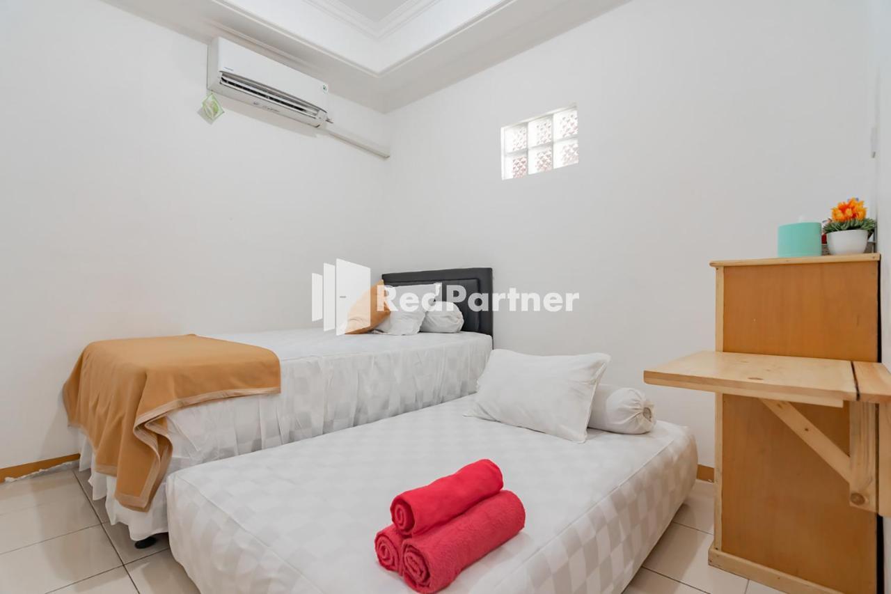Langkar Guest House Syariah Mitra Reddoorz Samarinda Buitenkant foto