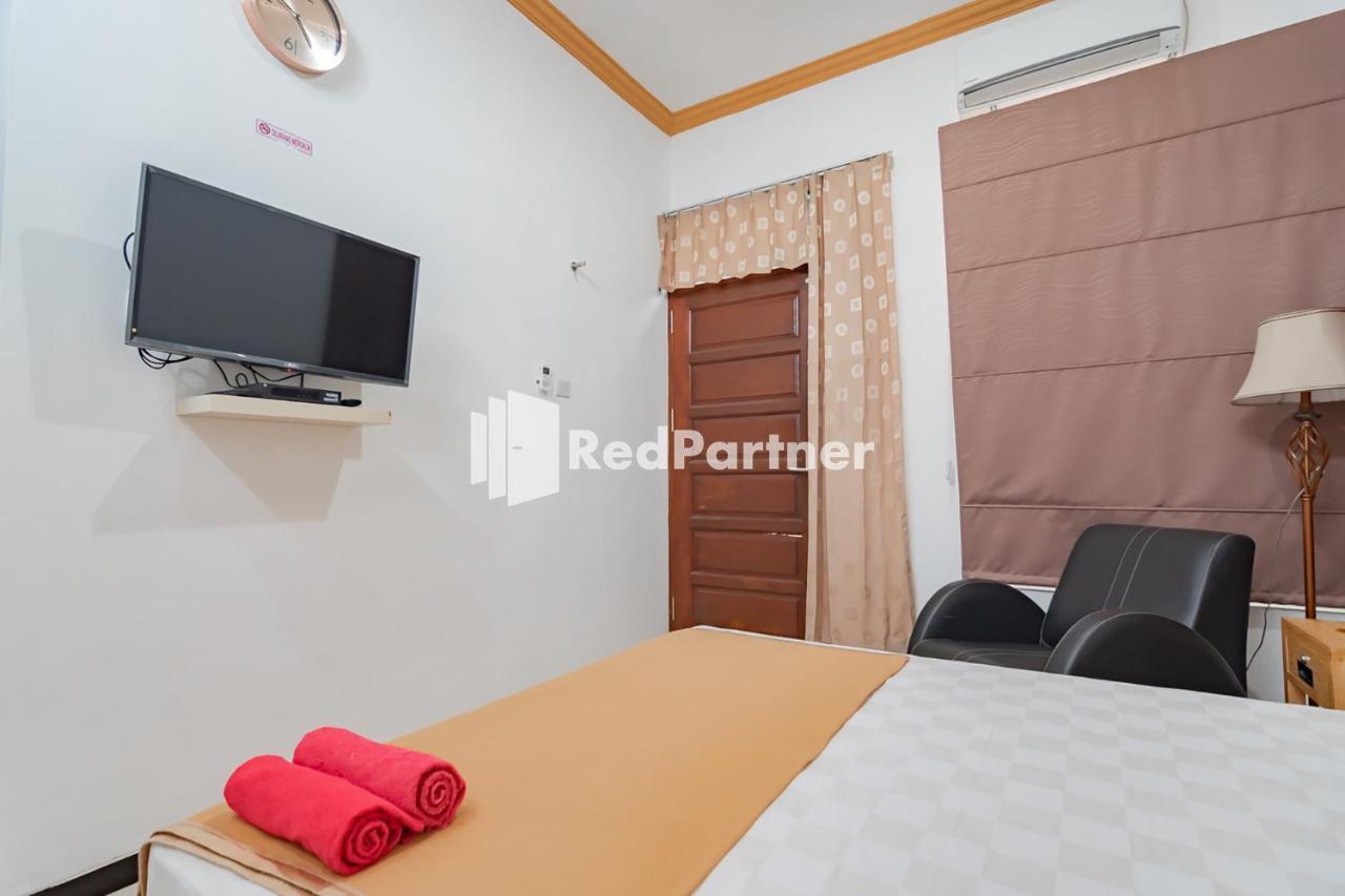 Langkar Guest House Syariah Mitra Reddoorz Samarinda Buitenkant foto
