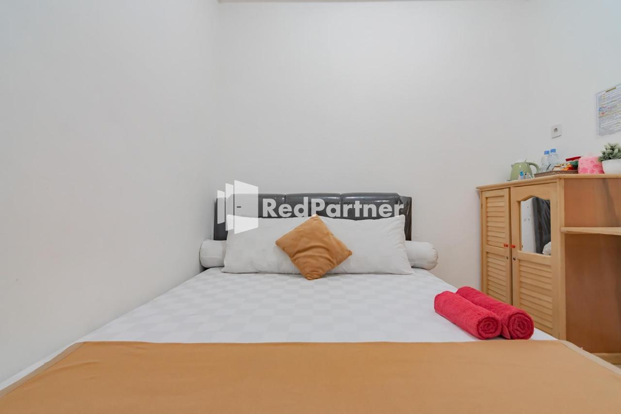Langkar Guest House Syariah Mitra Reddoorz Samarinda Buitenkant foto