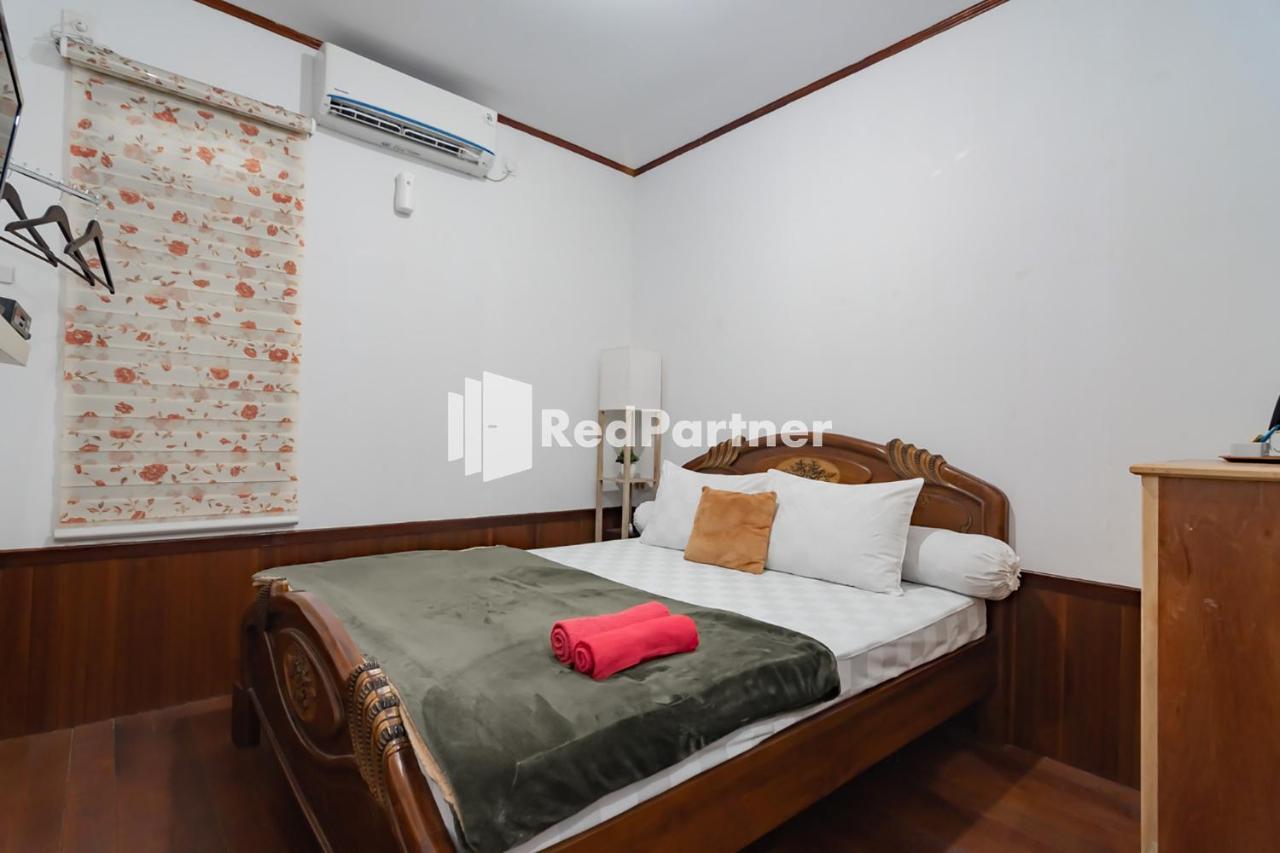 Langkar Guest House Syariah Mitra Reddoorz Samarinda Buitenkant foto